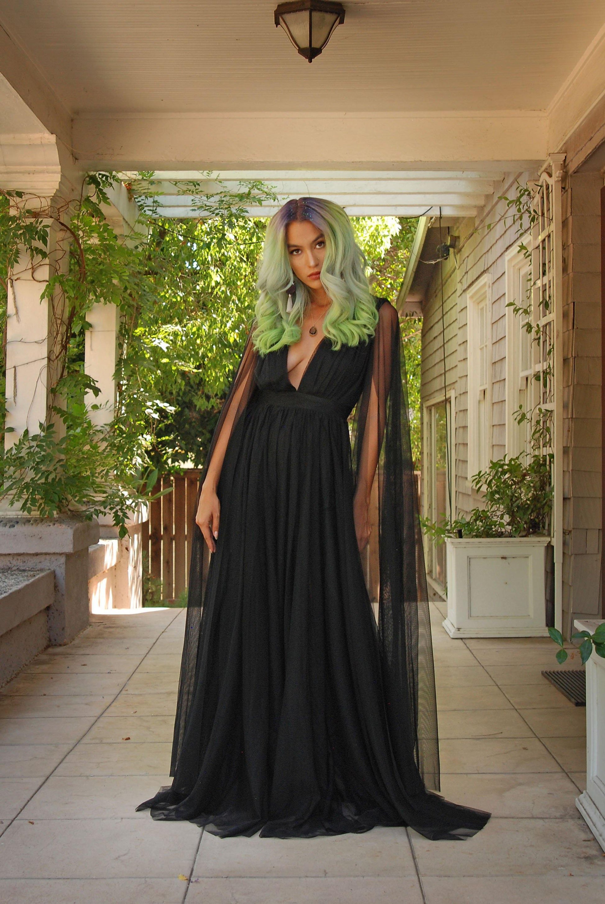 Coming Soon - Gothic Glamour Bombshell Gown in Black with Floor Length Sheer Cape Sleeves - pinupgirlclothing.com