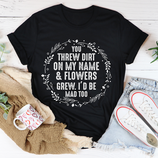 You Threw Dirt on My Name and Flowers Grew T-Shirt in Shell Pink or Black